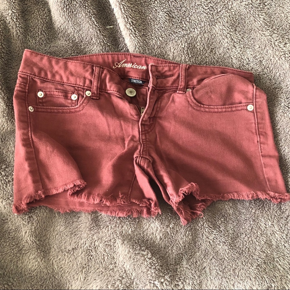 Maroon jean shorts by American Eagle